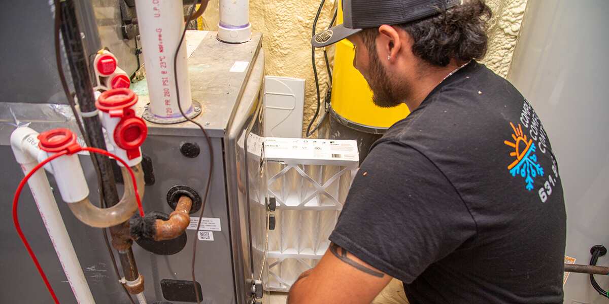 why do i smell oil when my furnace comes on